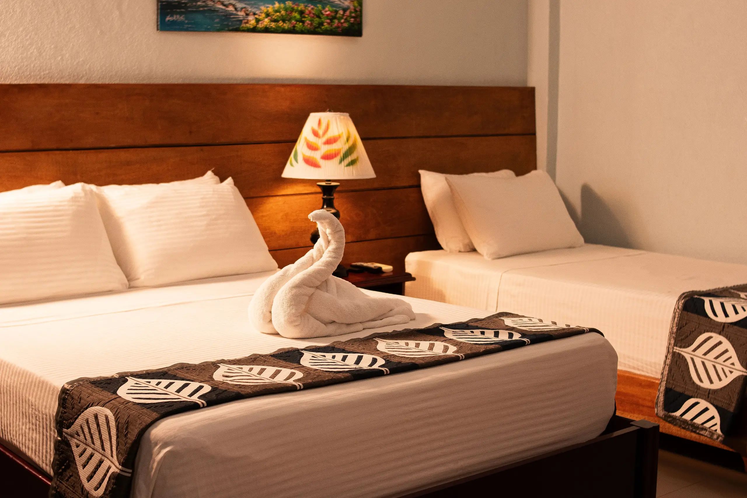 Guest room with two beds at La Fortuna Downtown hotel, in the center of Arenal Fortuna, Costa Rica