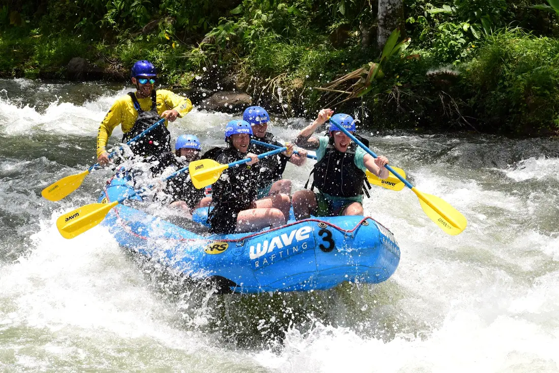 Group whitewater rafting on the rapids near La Fortuna